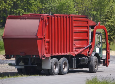 Eco-friendly waste disposal with an enclosed skip