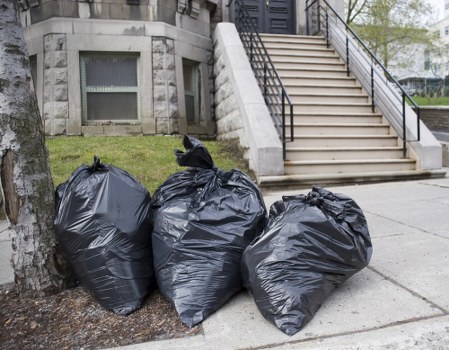 Workers performing timely waste clearance on a construction site