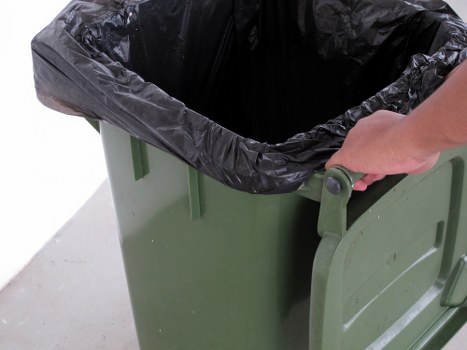 Clean-up project using a skip in Sanderstead